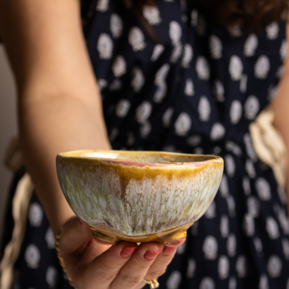 Pedestal Blue Round Ceramic Bowl - small hold by hand