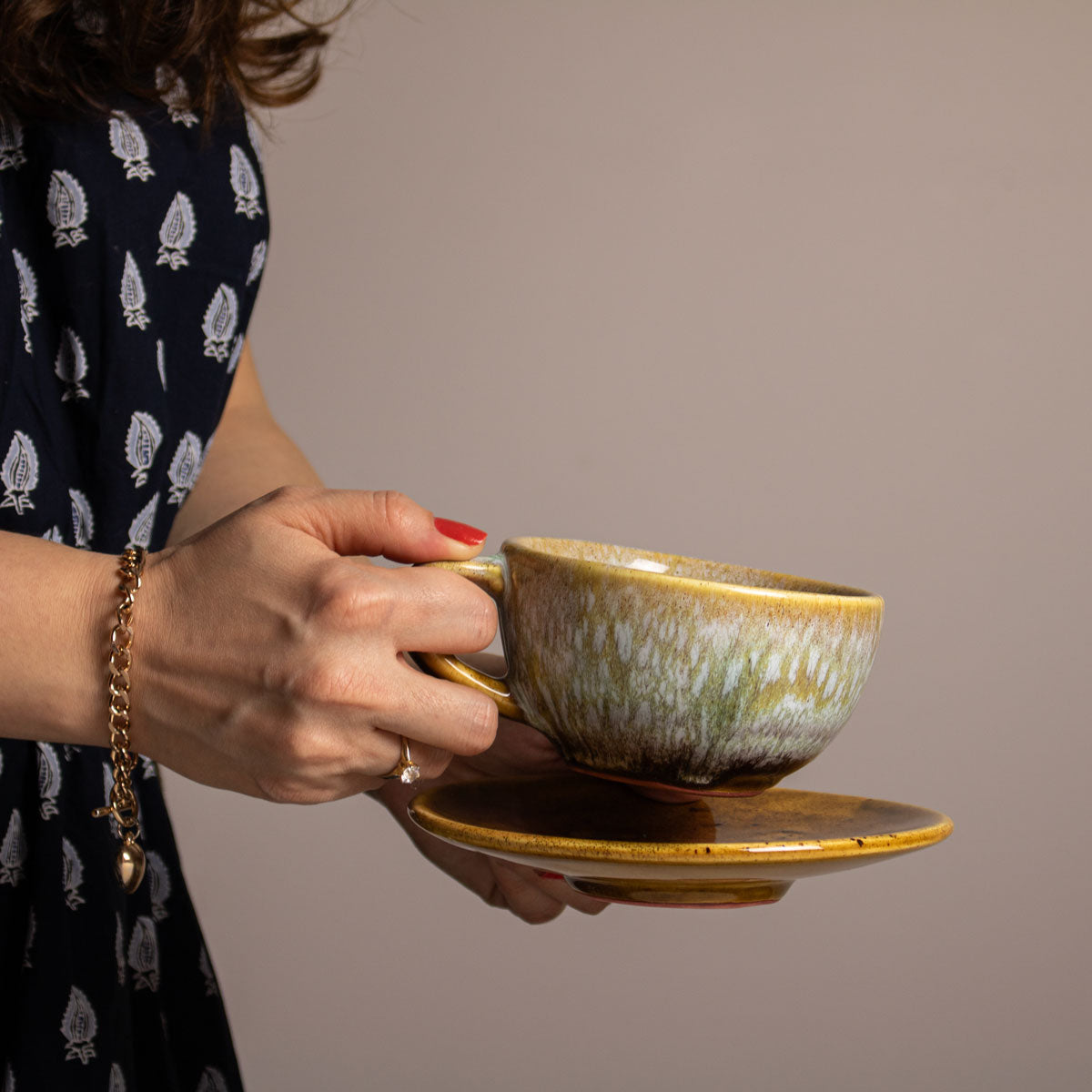 Blue Ceramic Cup in Hand