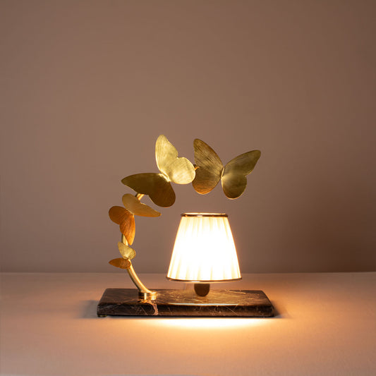 Butterfly console lamp made of brass with golden butterflies
